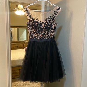 Black and nude cocktail dress